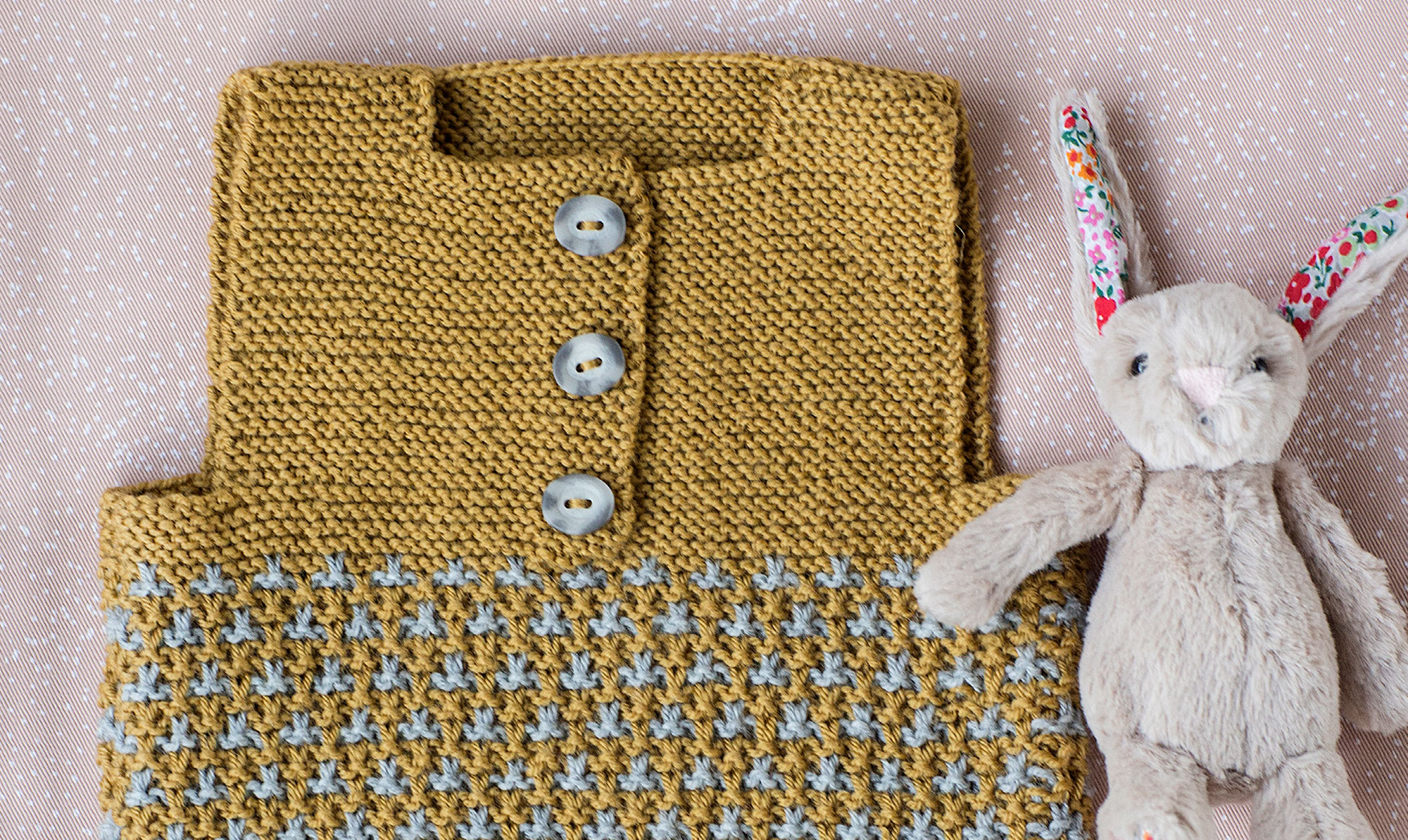 Lille fin babyvest. Strikket babyvest unisex