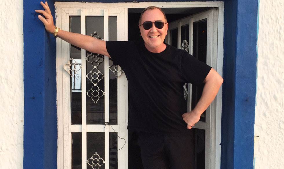 Vi har stillet 6 hurtige spørgsmål til designeren Michael Kors. Michael Kors
